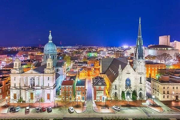 Harrisburg, Pennsylvania, USA nighttime cityscape with historic churches