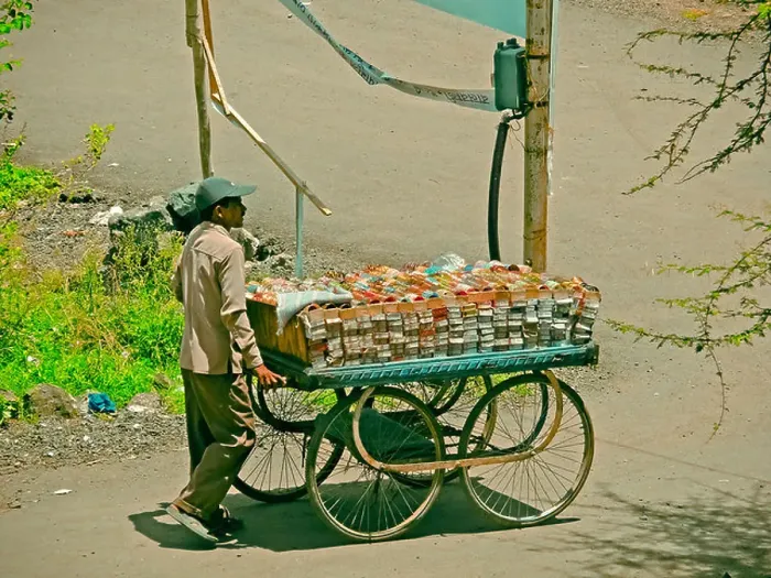 Framed Print : A hawker is selling colorful glass bangles on a barrow. Pune, Maharashtra, India Framed Print : A hawker is selling colorful glass bangles on a barrow. Pune, Maharashtra, India