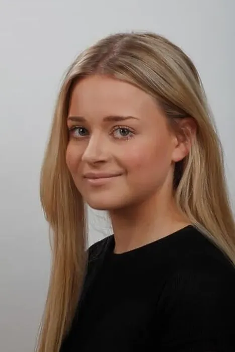 Framed Print : headshot or portrait of a young blonde woman with green eyes, wearing a black top Framed Print : headshot or portrait of a young blonde woman with green eyes, wearing a black top