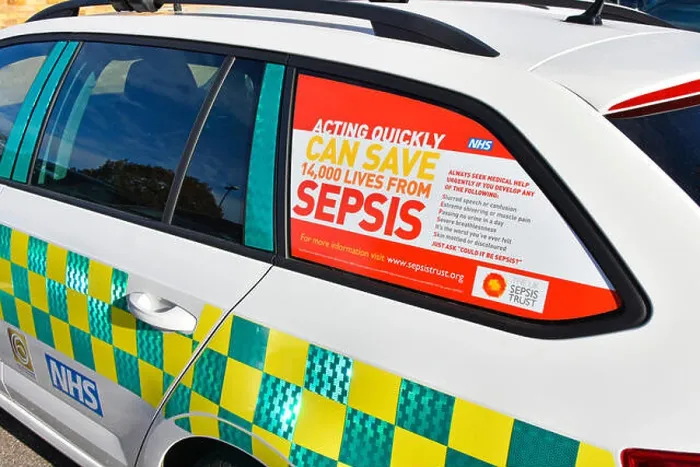 Framed Print : Healthcare awareness poster advert promotion saving lives from Sepsis NHS doctors car window in National Health service Framed Print : Healthcare awareness poster advert promotion saving lives from Sepsis NHS doctors car window in National Health service