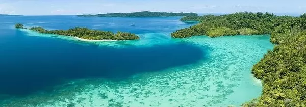 Healthy fringing coral reefs grow around the beautiful