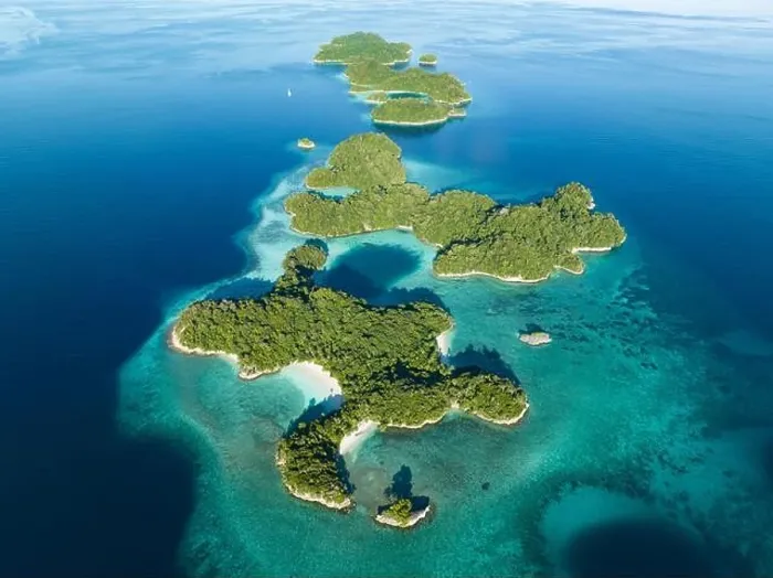 Framed Print : Healthy fringing coral reefs grow around the beautiful islands that rise from West Papua's seascape. This area is known for its high biodiversity Framed Print : Healthy fringing coral reefs grow around the beautiful islands that rise from West Papua's seascape. This area is known for its high biodiversity