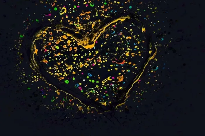Framed Print : Heart on a glass with paint splash effect on it on a black background Framed Print : Heart on a glass with paint splash effect on it on a black background