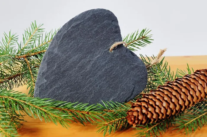 Framed Print : Heart from shale, fir tree branch and fir cone Framed Print : Heart from shale, fir tree branch and fir cone