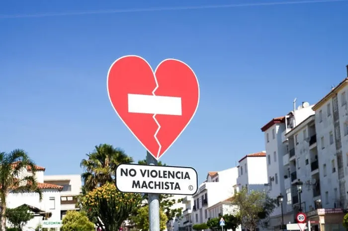 Framed Print : Heart-shaped traffic sign No Violencia Machista installed in an awareness campaign against domestic violence in Manilva - Malaga province, Spain Framed Print : Heart-shaped traffic sign No Violencia Machista installed in an awareness campaign against domestic violence in Manilva - Malaga province, Spain