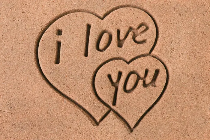 Framed Print : Two Hearts and message I Love You imprint on the sand Framed Print : Two Hearts and message I Love You imprint on the sand
