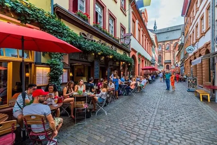 Framed Print : Heidelber, Germany - July 6, 2019: Marketplace crowded with tourists and Town Hall in Heidelberg in Germany