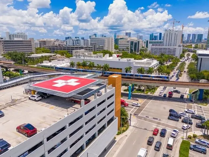 Framed Print : Helipad. Helicopter landing pad at a hospital. Aerial photo red H cross symbol. Medical center Framed Print : Helipad. Helicopter landing pad at a hospital. Aerial photo red H cross symbol. Medical center