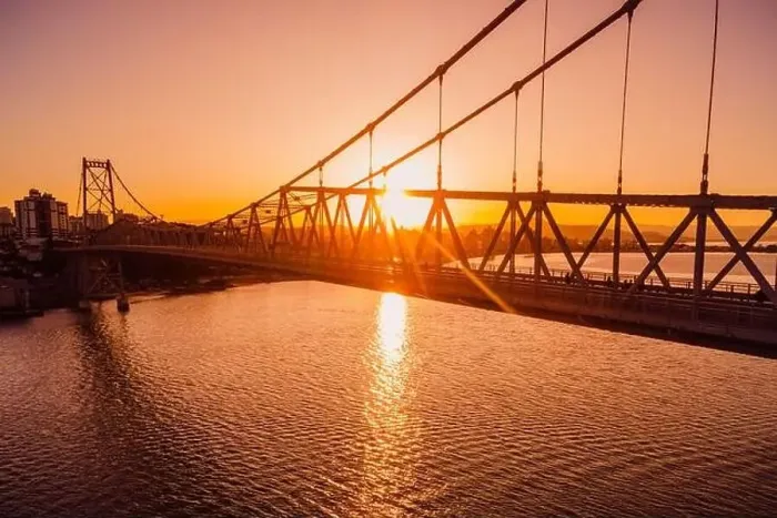 Framed Print : Hercilio luz cable bridge with sunset light in Florianopolis. Aerial view Framed Print : Hercilio luz cable bridge with sunset light in Florianopolis. Aerial view
