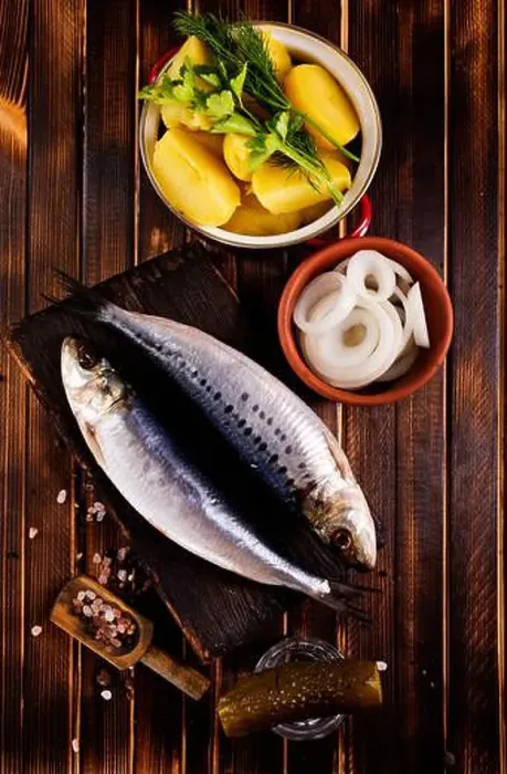 Framed Print : Herring or Baltic herring with salt on dark backgruond
