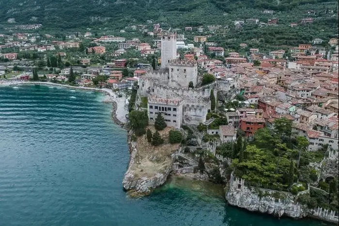 Framed Print : High angle aerial drone shot view of Castello Malcesine village in Italy Framed Print : High angle aerial drone shot view of Castello Malcesine village in Italy