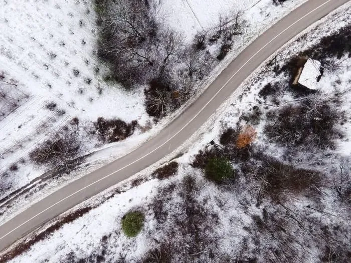 Framed Print : High angle top down aerial view drone image on road trough the trees Framed Print : High angle top down aerial view drone image on road trough the trees