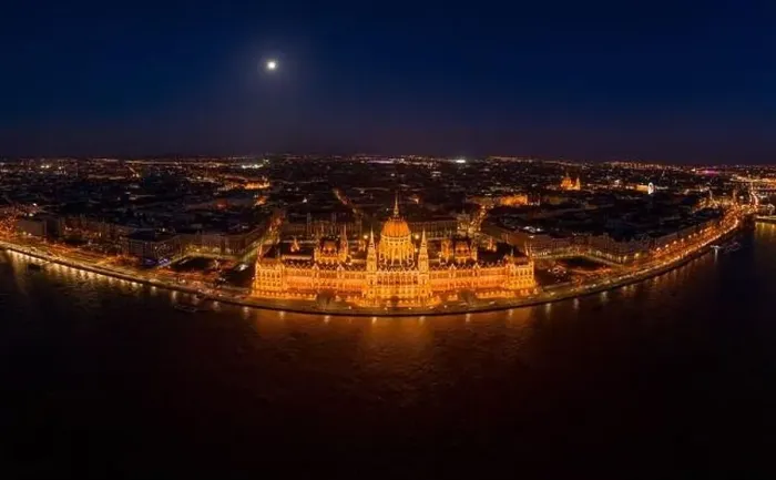 Framed Print : High angle panorama aerial drone shot of front facade of Hungarian Parliament with lights Framed Print : High angle panorama aerial drone shot of front facade of Hungarian Parliament with lights