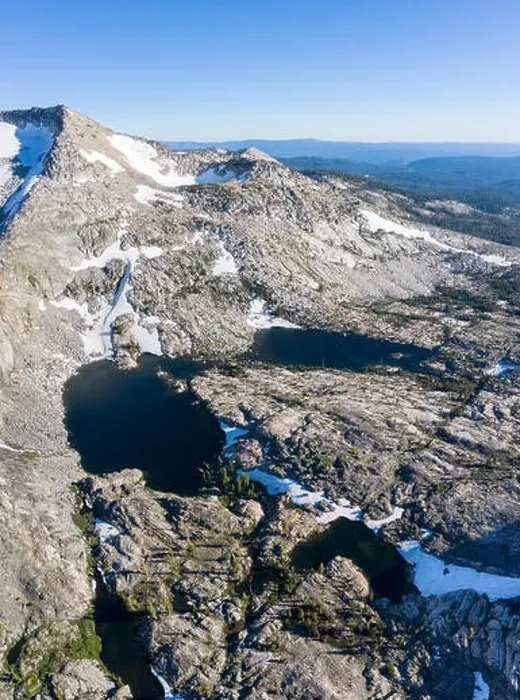 Framed Print : High granite mountains surround beautiful lakes in the Desolation Wilderness, California. This mountainous area is a popular backpacking destination Framed Print : High granite mountains surround beautiful lakes in the Desolation Wilderness, California. This mountainous area is a popular backpacking destination