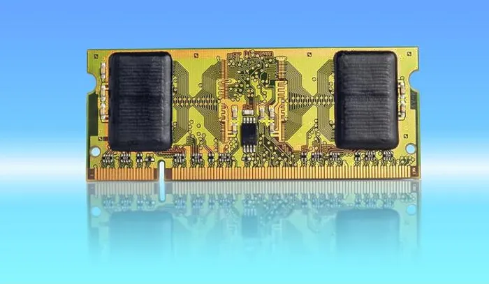 Framed Print : A high-quality RAM memory module rests on a glossy reflective surface against a blue gradient backdrop