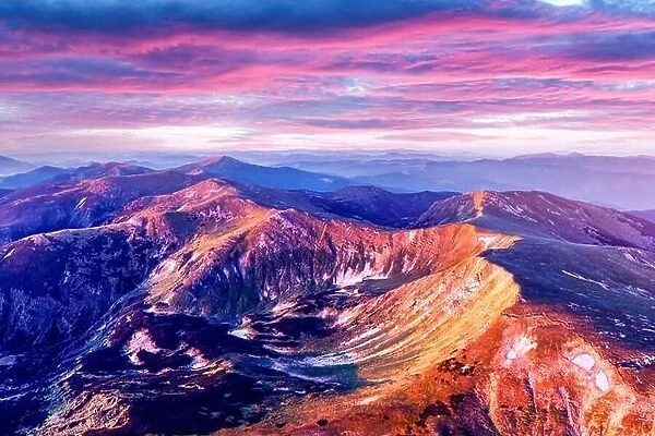 Hight mountains during purple sunset in spring season. Landscape photography