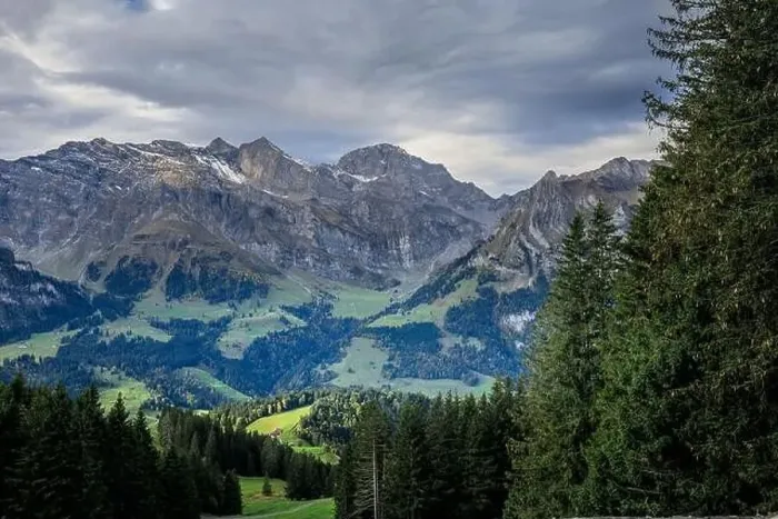 Framed Print : Hiking near Engelberg with a view of the Swiss Alps, summer Framed Print : Hiking near Engelberg with a view of the Swiss Alps, summer