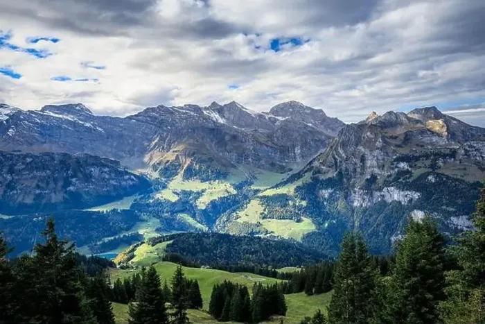 Framed Print : Hiking near Engelberg with a view of the Swiss Alps, summer Framed Print : Hiking near Engelberg with a view of the Swiss Alps, summer