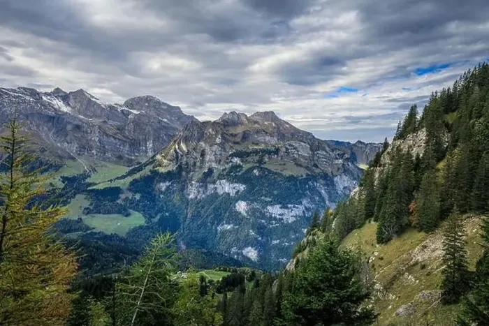 Framed Print : Hiking near Engelberg with a view of the Swiss Alps, summer Framed Print : Hiking near Engelberg with a view of the Swiss Alps, summer