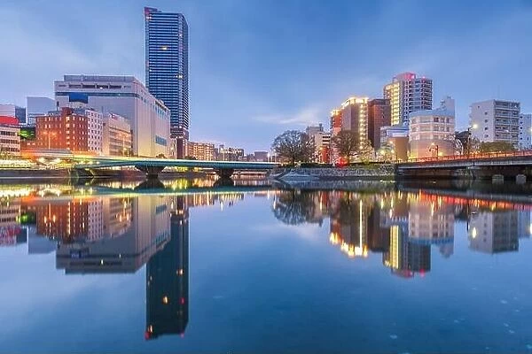 Hiroshima, Japan downtown cityscape on the Enko River at twilight