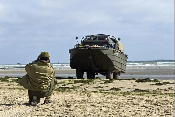 Framed Print : Historical reenactors drive World War Two era American amphibious vehicles on Utah Beach, Normandy, France Framed Print : Historical reenactors drive World War Two era American amphibious vehicles on Utah Beach, Normandy, France