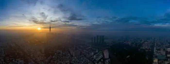 Framed Print : Ho Chi Minh City early morning aerial panorama with fog over Binh Thanh and District one featuring sunrise Framed Print : Ho Chi Minh City early morning aerial panorama with fog over Binh Thanh and District one featuring sunrise
