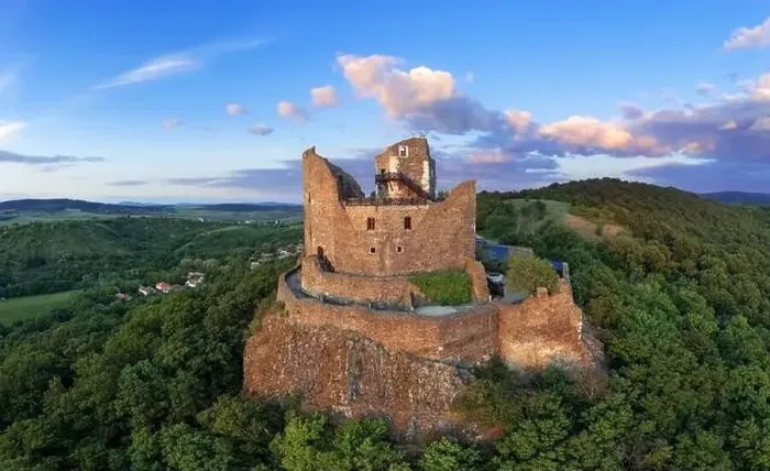 Framed Print : Holloko castle in Hungary. This historical medieval castle ruin is in the Cserhat hills Framed Print : Holloko castle in Hungary. This historical medieval castle ruin is in the Cserhat hills