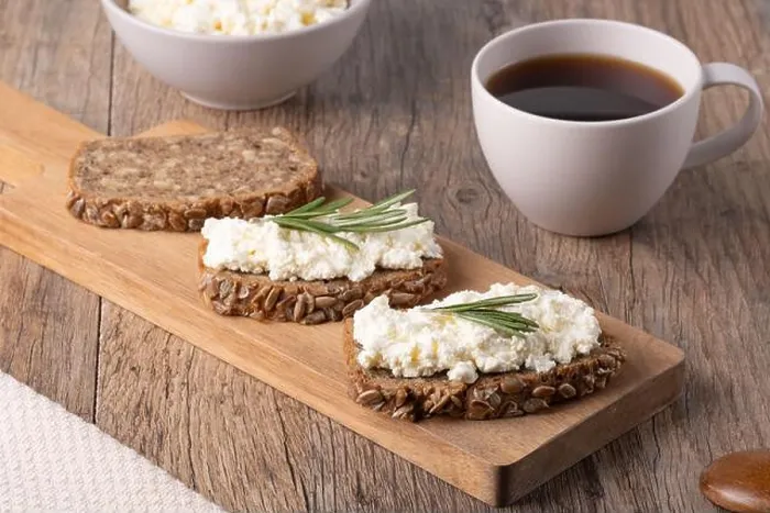 Framed Print : Homemade rye bread with cottage cheese in a plate and coffee Framed Print : Homemade rye bread with cottage cheese in a plate and coffee