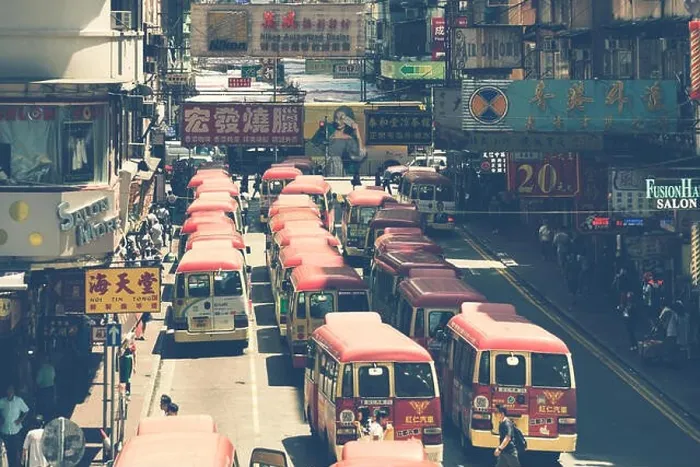 Framed Print : Hong Kong, China - August 14, 2017: Minibuses lining up, waiting for passengers at a busy station in Mongkok, Hong Kong, China Framed Print : Hong Kong, China - August 14, 2017: Minibuses lining up, waiting for passengers at a busy station in Mongkok, Hong Kong, China