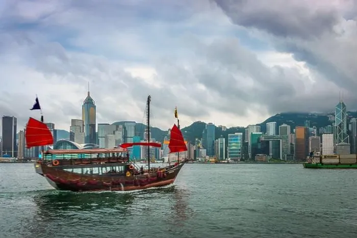 Framed Print : Hong Kong, China downtown cityscape from the harbor at dusk Framed Print : Hong Kong, China downtown cityscape from the harbor at dusk