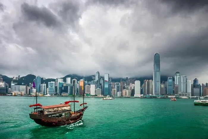 Framed Print : Hong Kong, China downtown cityscape from the harbor at dusk Framed Print : Hong Kong, China downtown cityscape from the harbor at dusk