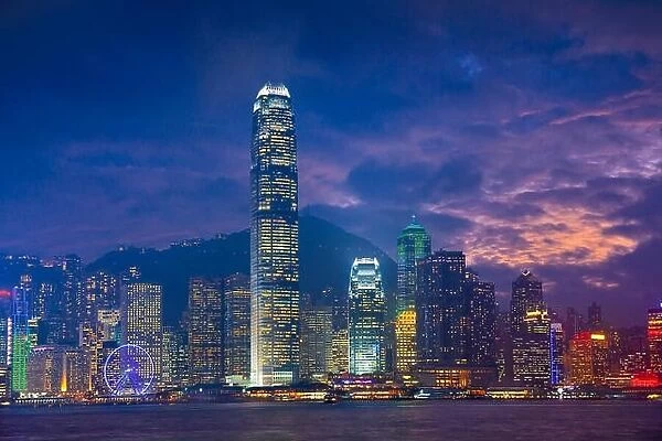 Hong Kong. Image of Hong Kong with many skyscrapers during dramatic sunset