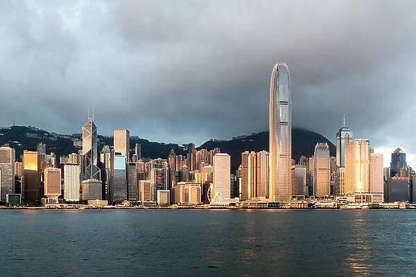 Hong Kong skyline with sunlight in the morning over Victoria Harbour in Hong Kong