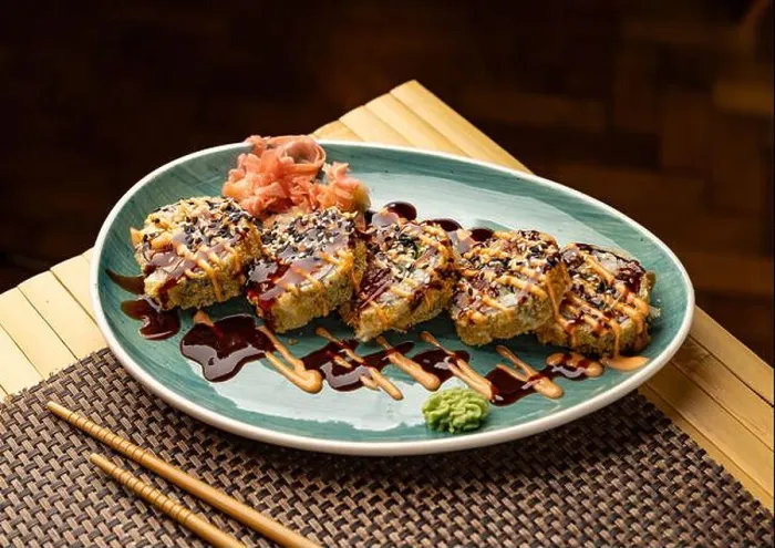Framed Print : Hot fried sushi roll lying on plate with wasabi and ginger Framed Print : Hot fried sushi roll lying on plate with wasabi and ginger