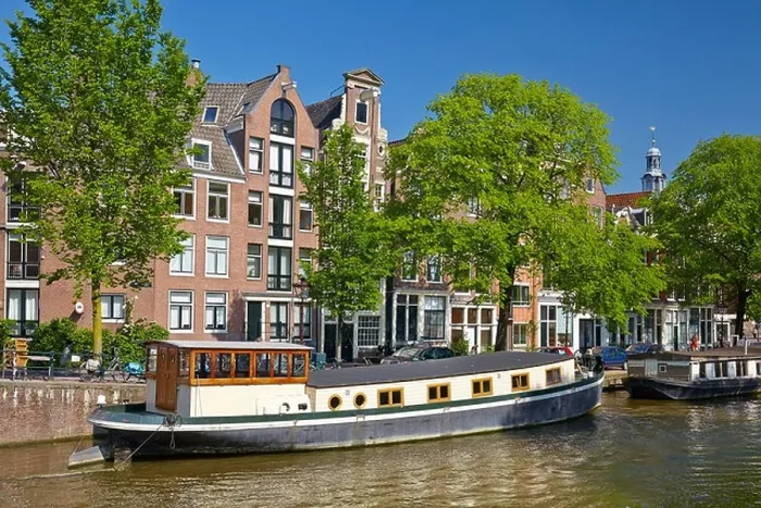 Framed Print : Houseboat barge, Amsterdam canal - Holland Netherlands Framed Print : Houseboat barge, Amsterdam canal - Holland Netherlands
