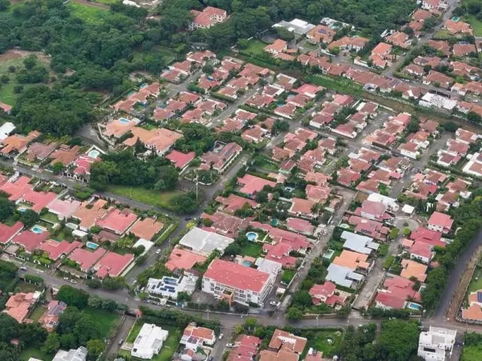 Framed Print : Many houses with pool in residential aerial drone view Framed Print : Many houses with pool in residential aerial drone view