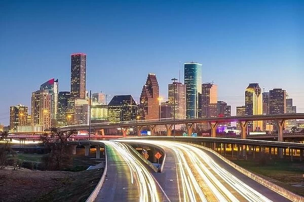 Houston, Texas, USA downtown skyline over the highways at dusk