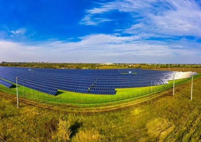 Framed Print : Huge solar power plant to use solar energy in a picturesque green field in Ukraine. Aerial panoramic drone shot Framed Print : Huge solar power plant to use solar energy in a picturesque green field in Ukraine. Aerial panoramic drone shot