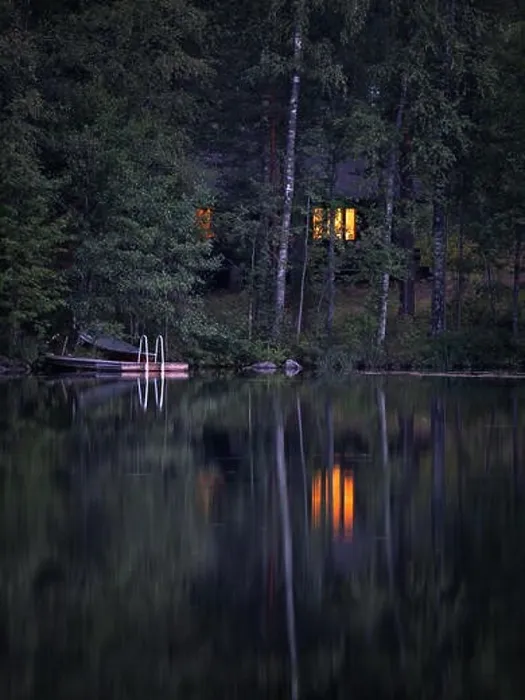 Framed Print : Idyllic cottage view with cozy cottage and window ligth at tranquil summer night in Finland Framed Print : Idyllic cottage view with cozy cottage and window ligth at tranquil summer night in Finland