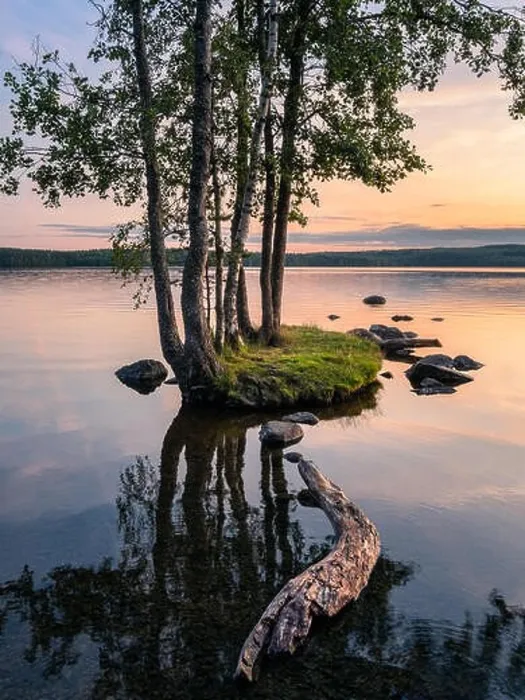 Framed Print : Idyllic smalll island with tranquil lake and beautiful sunset at summer evening in Finland Framed Print : Idyllic smalll island with tranquil lake and beautiful sunset at summer evening in Finland