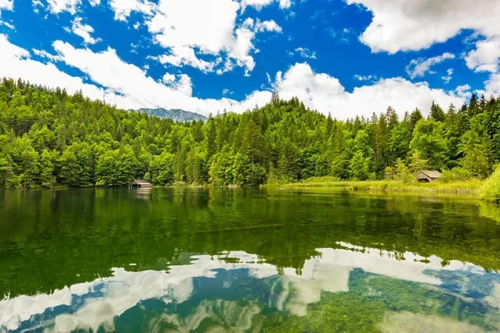Framed Print : Idyllic summer landscape with clear mountain lake in the Alps. Tranquil nature landscape in the Alps, Europe. Water reflection, blue sky, pine forest Framed Print : Idyllic summer landscape with clear mountain lake in the Alps. Tranquil nature landscape in the Alps, Europe. Water reflection, blue sky, pine forest
