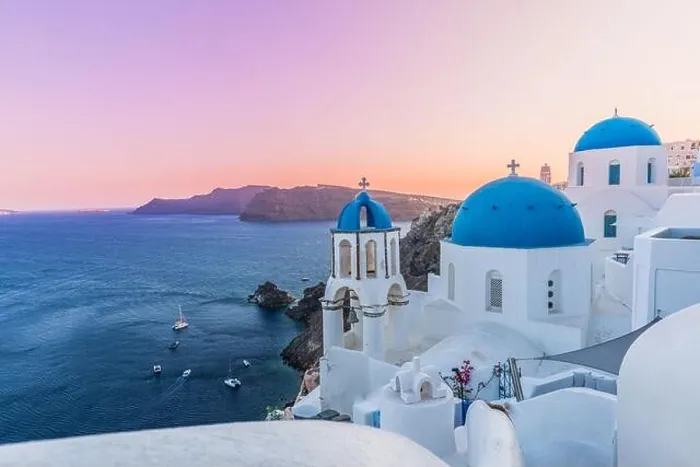 Framed Print : Idyllic summer sunset vacation, urban landscape, tourism destination scenic. Oia, Thira panoramic views. Greek island of Santorin