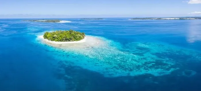Framed Print : An idyllic tropical island is surrounded by reef in the Halmahera Sea, Indonesia. This remote region is part of the heart of the Coral Triangle Framed Print : An idyllic tropical island is surrounded by reef in the Halmahera Sea, Indonesia. This remote region is part of the heart of the Coral Triangle