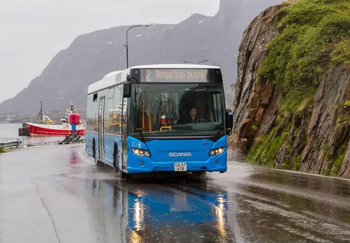 Framed Print : Illoqarfiup bus at Sisimiut, Greenland on a wet rainy day in July Framed Print : Illoqarfiup bus at Sisimiut, Greenland on a wet rainy day in July