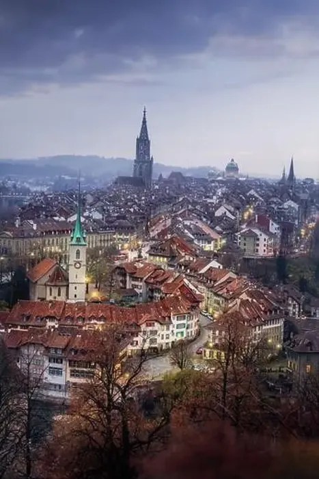 Framed Print : Illuminated view of Bern Old Town at sunset with Bern Minster and Nydeggkirche Church - Bern, Switzerland Framed Print : Illuminated view of Bern Old Town at sunset with Bern Minster and Nydeggkirche Church - Bern, Switzerland