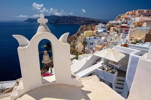 Image of famous cyclades village Oia located at the island of Santorini, South Aegean, Greece