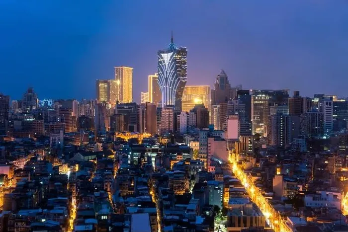 Framed Print : Image of Macau (Macao), China. Skyscraper hotel and casino building at downtown in Macau (Macao). Asian tourism, modern city life, or business finance Framed Print : Image of Macau (Macao), China. Skyscraper hotel and casino building at downtown in Macau (Macao). Asian tourism, modern city life, or business finance