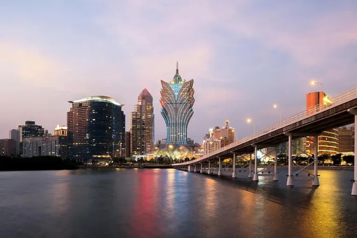 Framed Print : Image of Macau (Macao), China. Skyscraper hotel and casino building at downtown in Macau (Macao) Framed Print : Image of Macau (Macao), China. Skyscraper hotel and casino building at downtown in Macau (Macao)