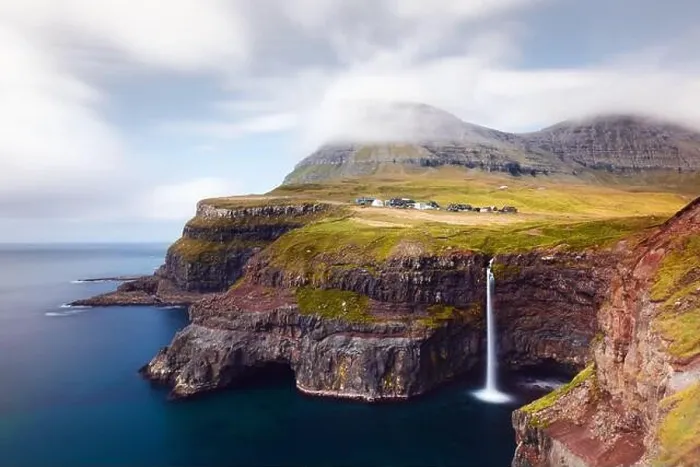 Framed Print : Incredible autumn view of Mulafossur waterfall in Gasadalur village, Vagar Island of the Faroe Islands, Denmark. Landscape photography Framed Print : Incredible autumn view of Mulafossur waterfall in Gasadalur village, Vagar Island of the Faroe Islands, Denmark. Landscape photography