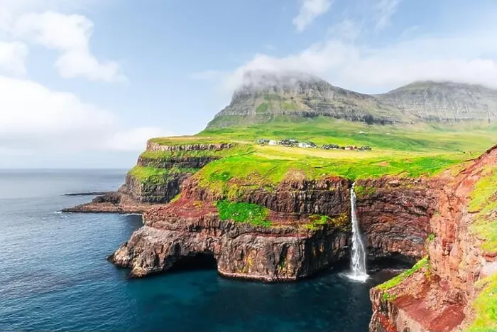 Framed Print : Incredible autumn view of Mulafossur waterfall in Gasadalur village, Vagar Island of the Faroe Islands, Denmark. Landscape photography Framed Print : Incredible autumn view of Mulafossur waterfall in Gasadalur village, Vagar Island of the Faroe Islands, Denmark. Landscape photography